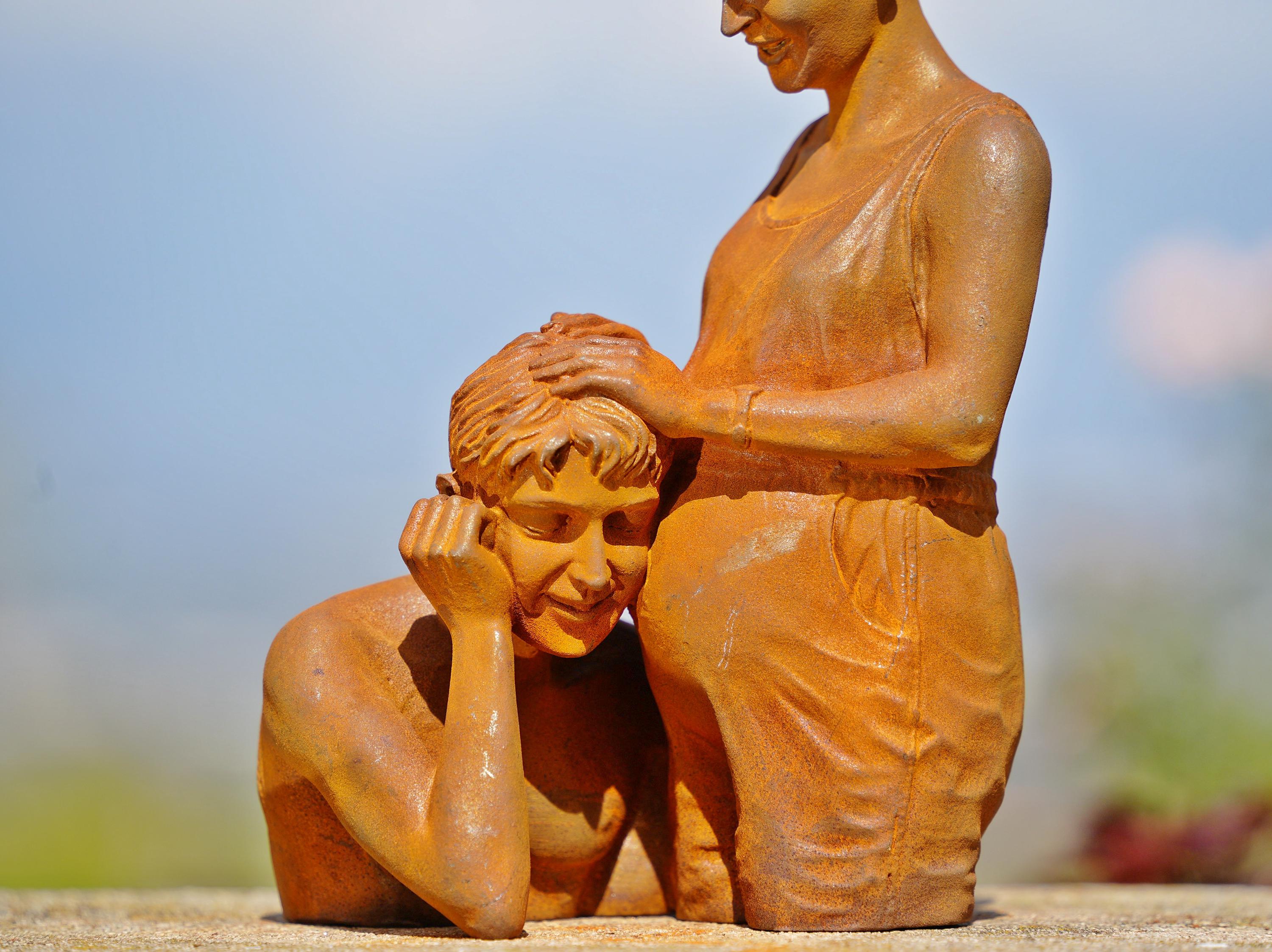 Handcrafted Cast Iron Maternity Sculpture: Expecting Couple Garden Art
