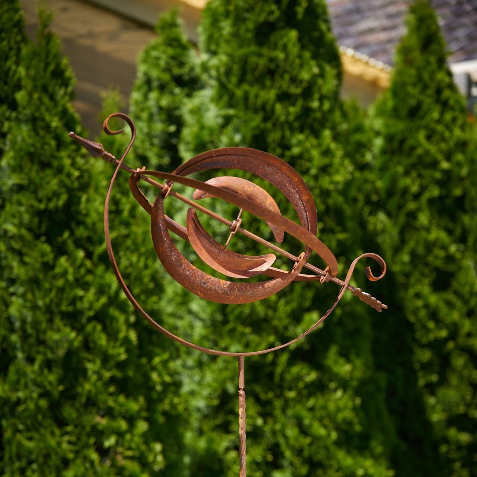 Rusty Armillary Sphere Wind Spinner — Metal Garden Ornament