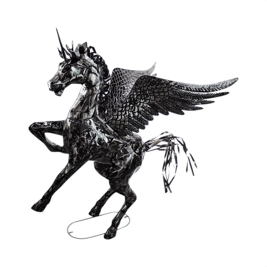 A black and white image depicting a winged, metallic sculpture resembling a mythical creature, possibly a unicorn or a mythical bird.