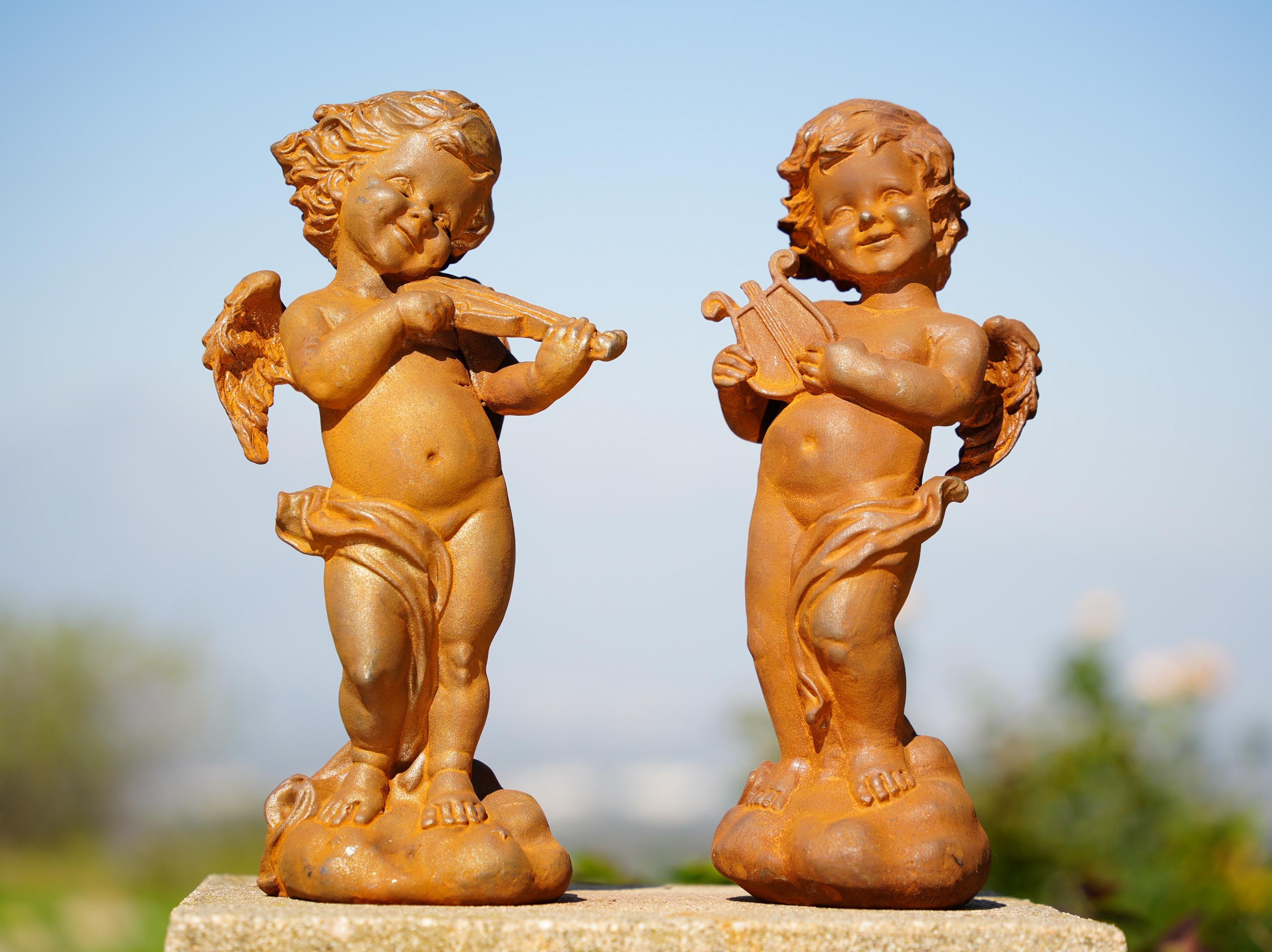 Cast Iron Cherub Angel Statues: Musical Garden Sculptures