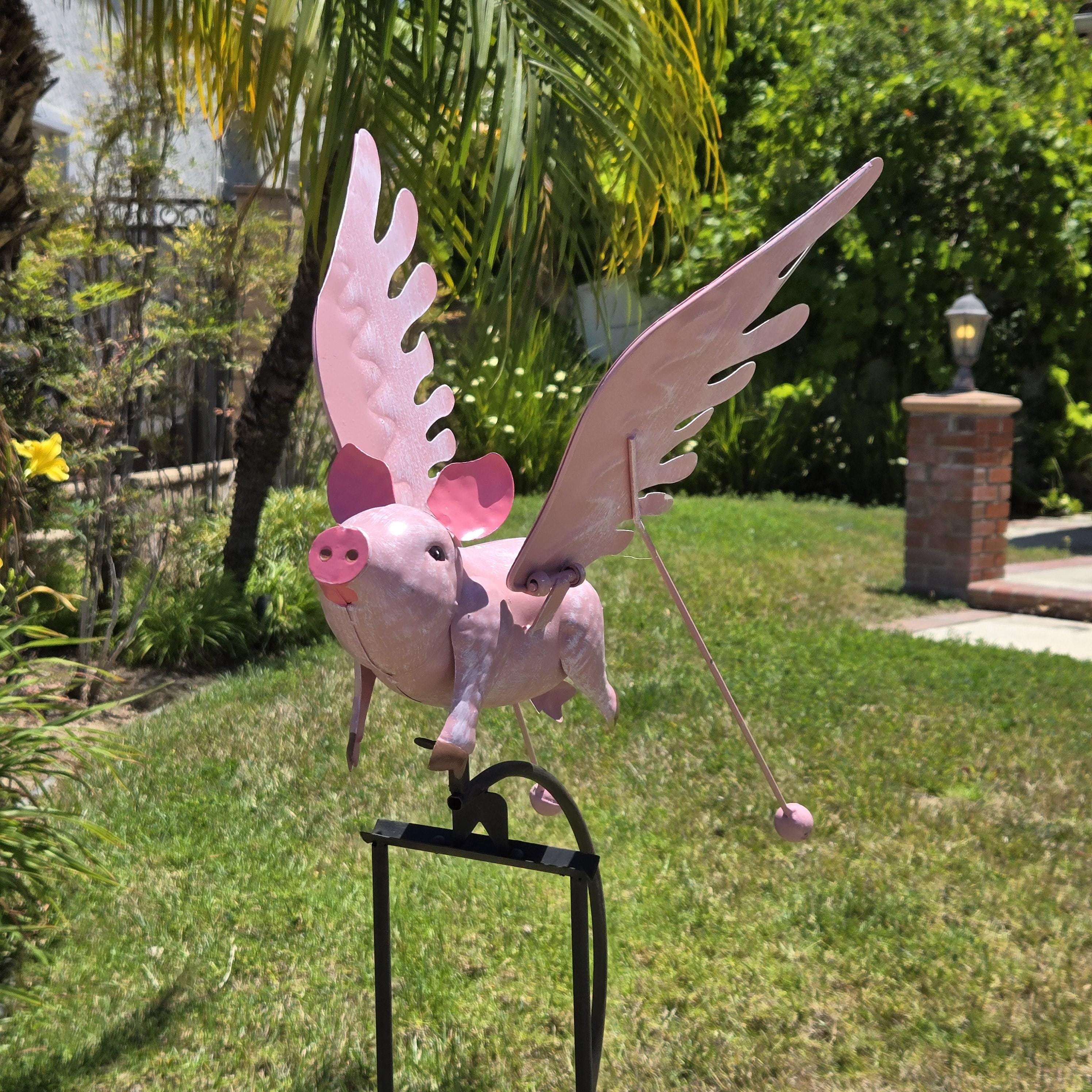 Pink Flying Pig Garden Rocker: Steel Balancing Lawn Ornament