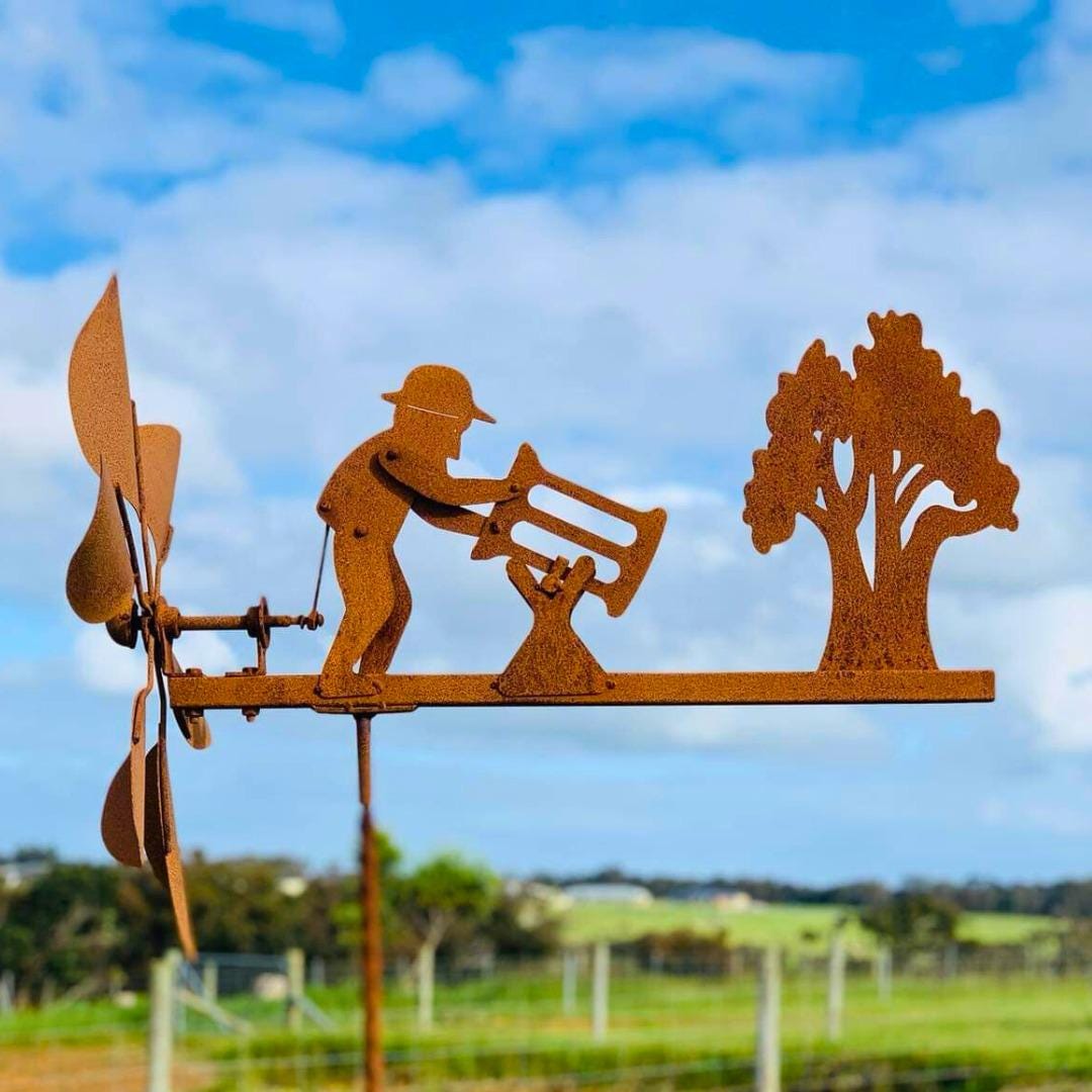Rusty Lumberjack Wind Spinner — Kinetic Wind-Powered Metal Garden Sculpture