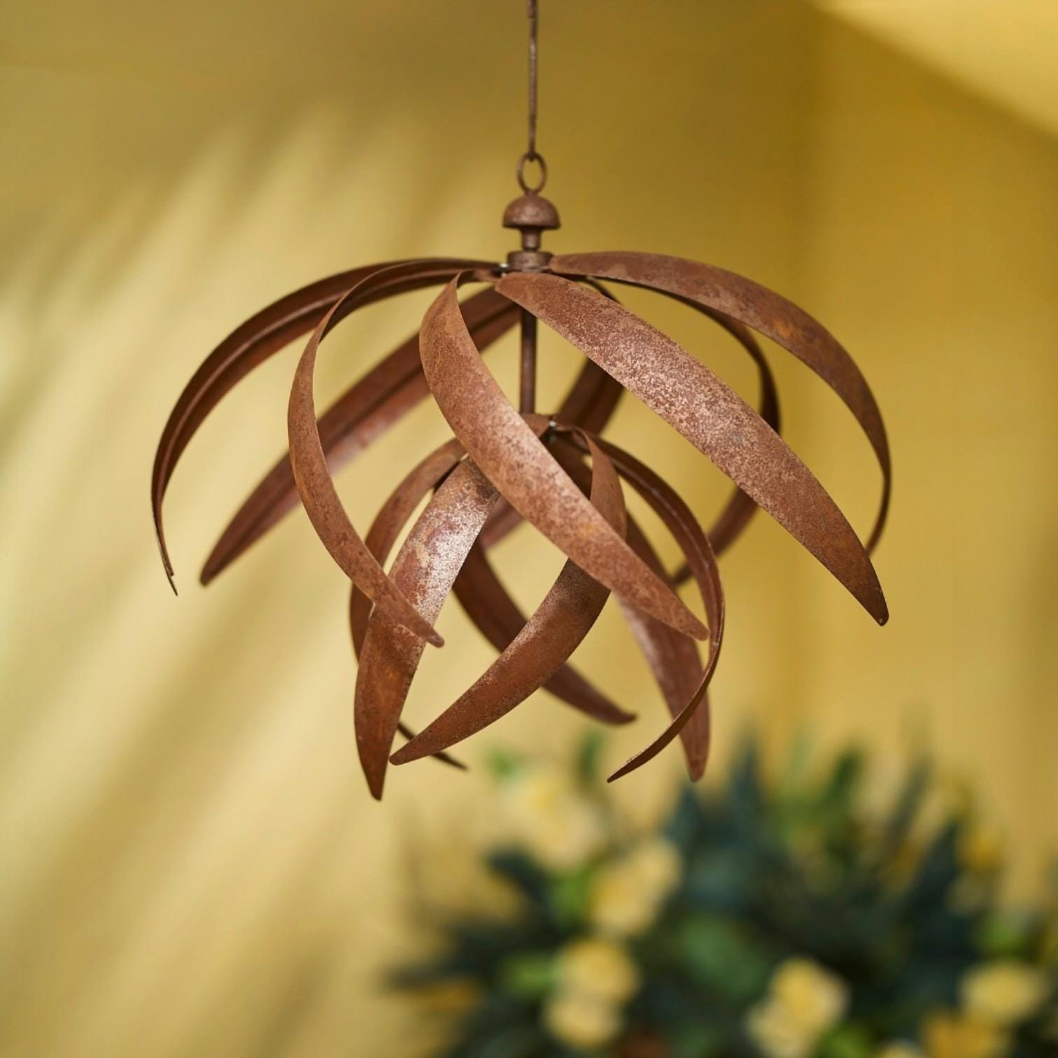 Hoisting Rusty Iron Lotus Wind Spinner - Weathered Garden Art
