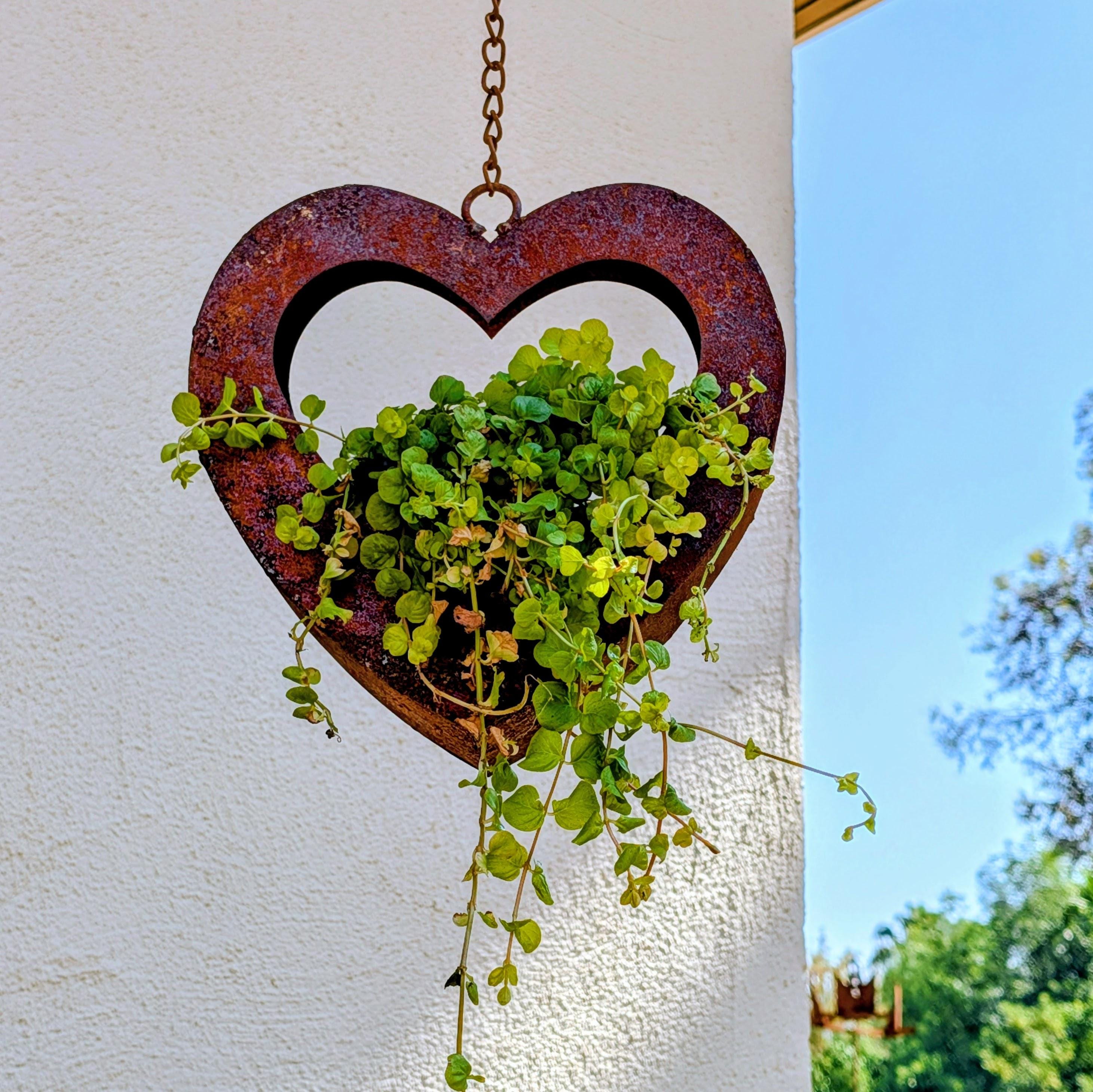 Rusted-style hanging heart-shaped planter