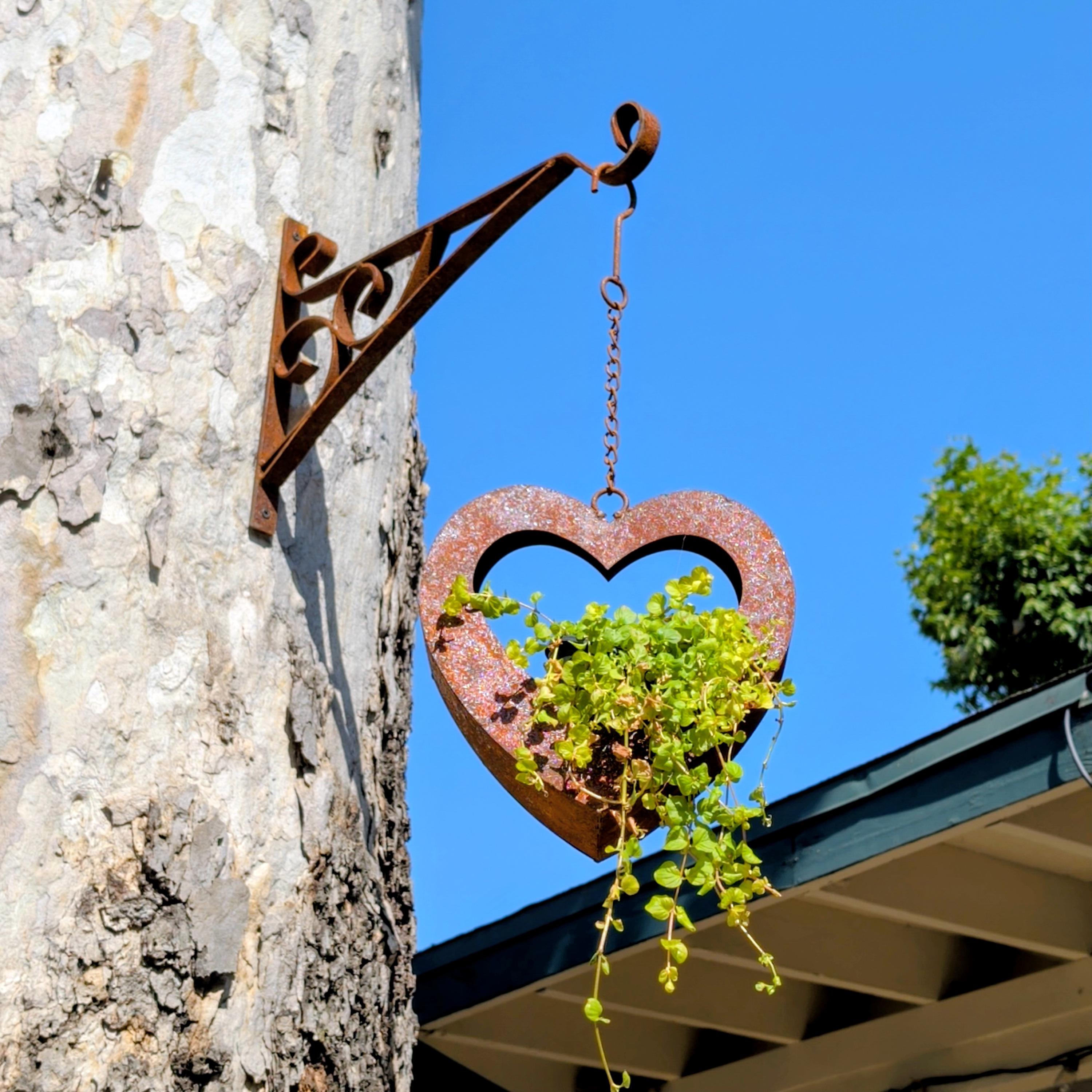 Rusted-style hanging heart-shaped planter
