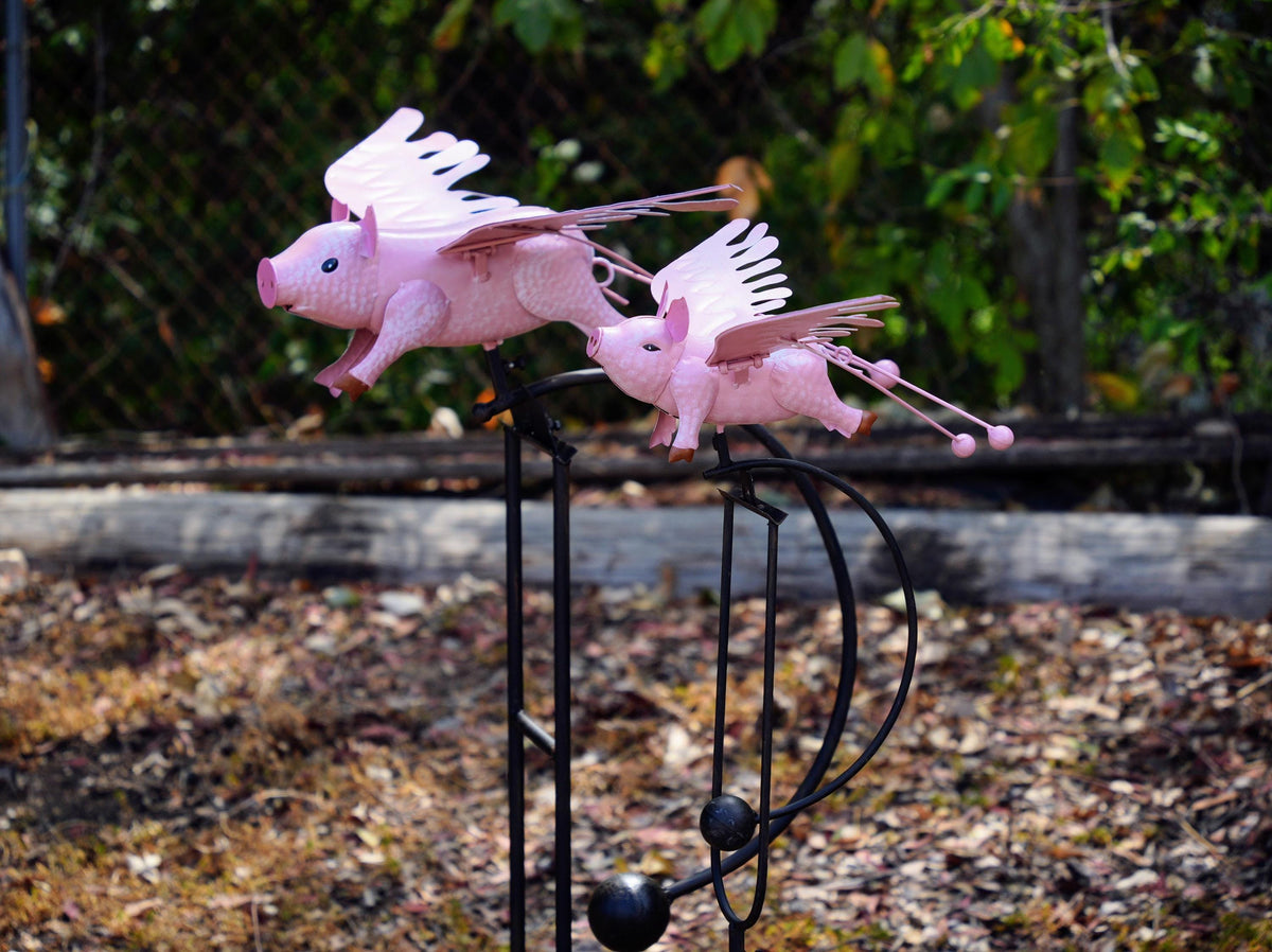 Pink Flying Pig Garden Rocker: Steel Balancing Lawn Ornament