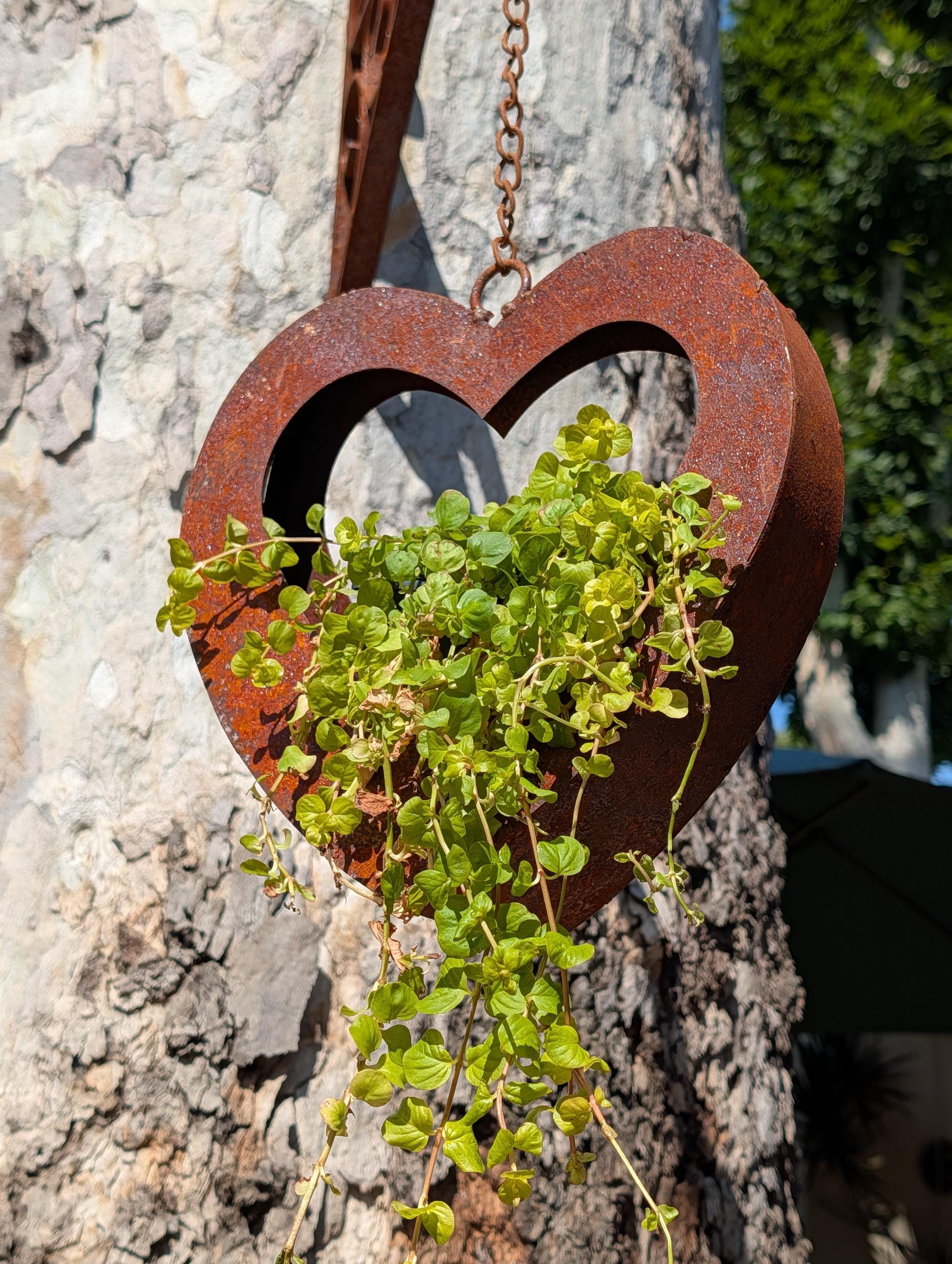 Rusted-style hanging heart-shaped planter