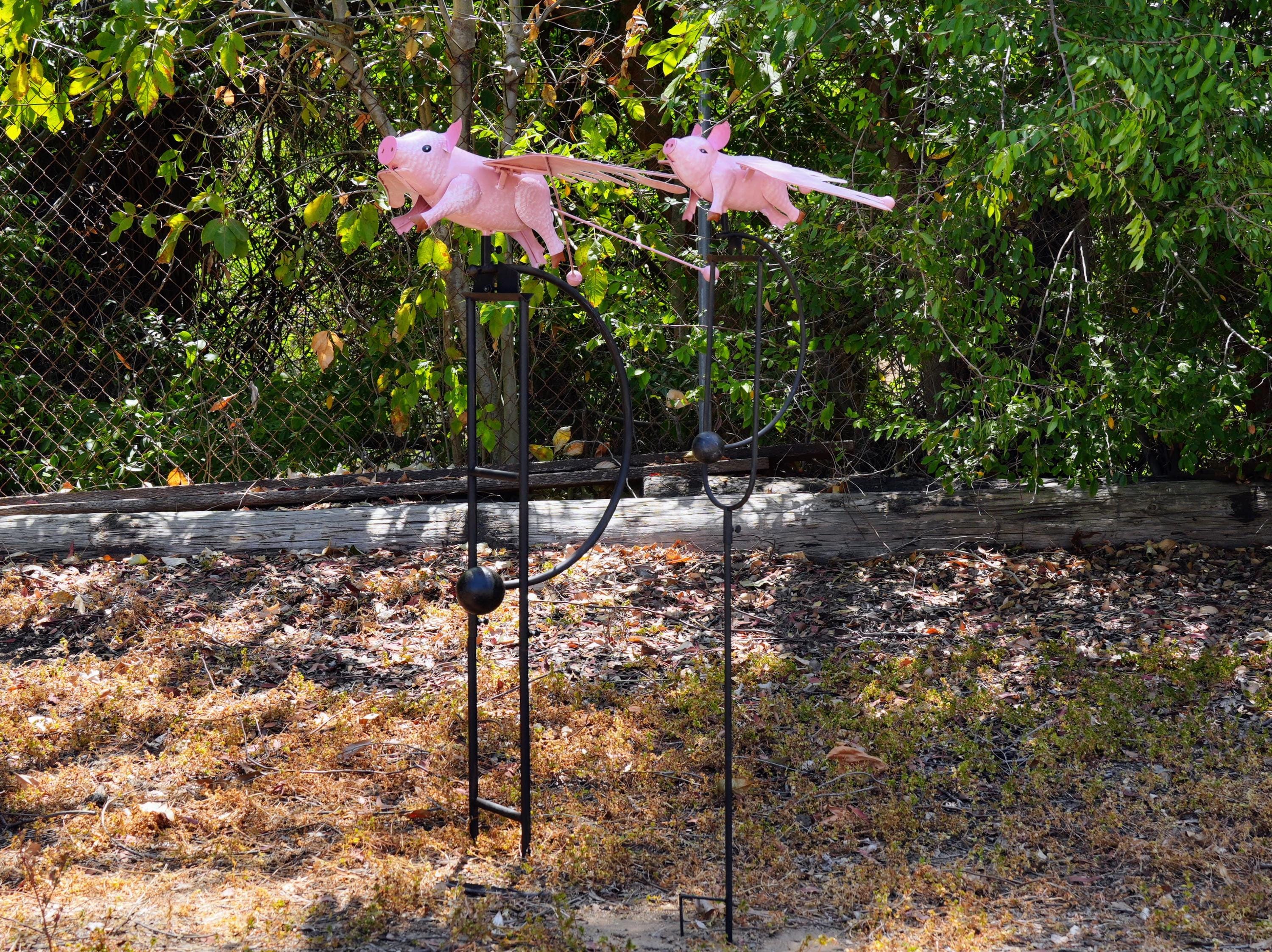 Pink Flying Pig Garden Rocker: Steel Balancing Lawn Ornament