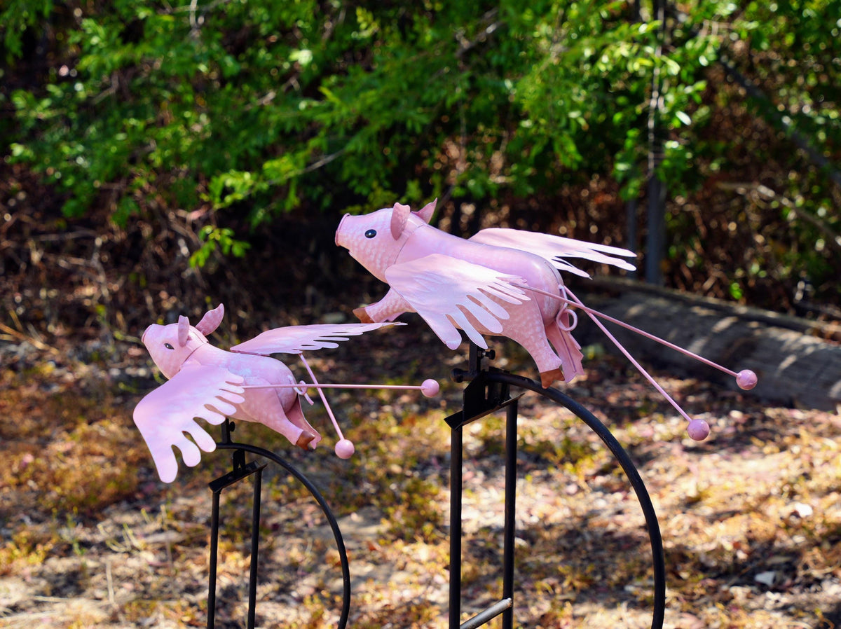 Pink Flying Pig Garden Rocker: Steel Balancing Lawn Ornament