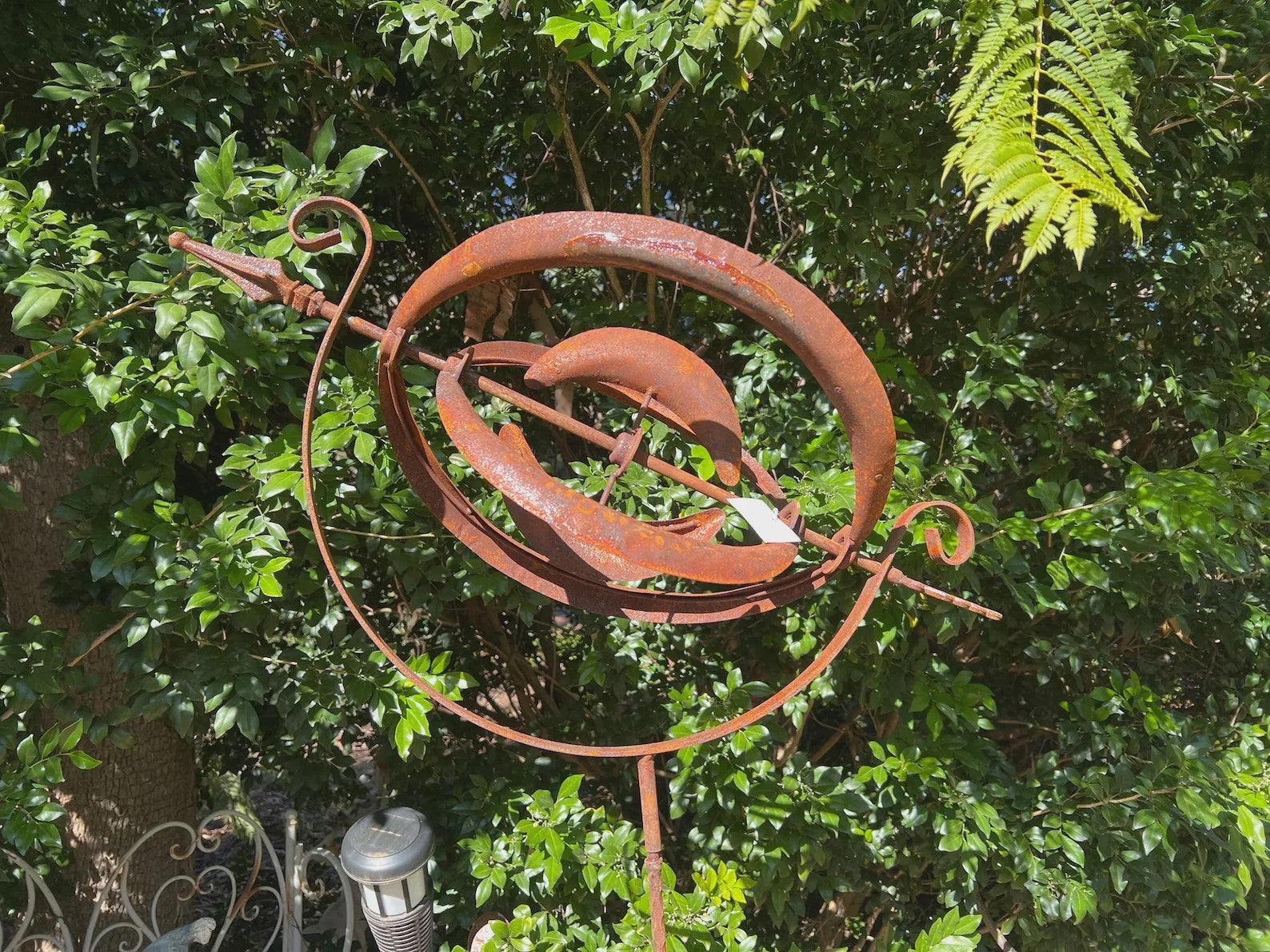 Rusty Armillary Sphere Wind Spinner — Metal Garden Ornament