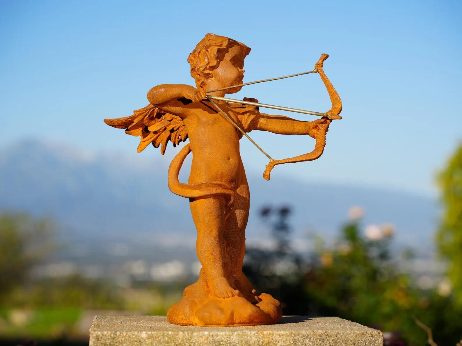 Vintage Cast Iron Cupid Statue Rustic Garden Cherub with Bow Outdoor Yard Art