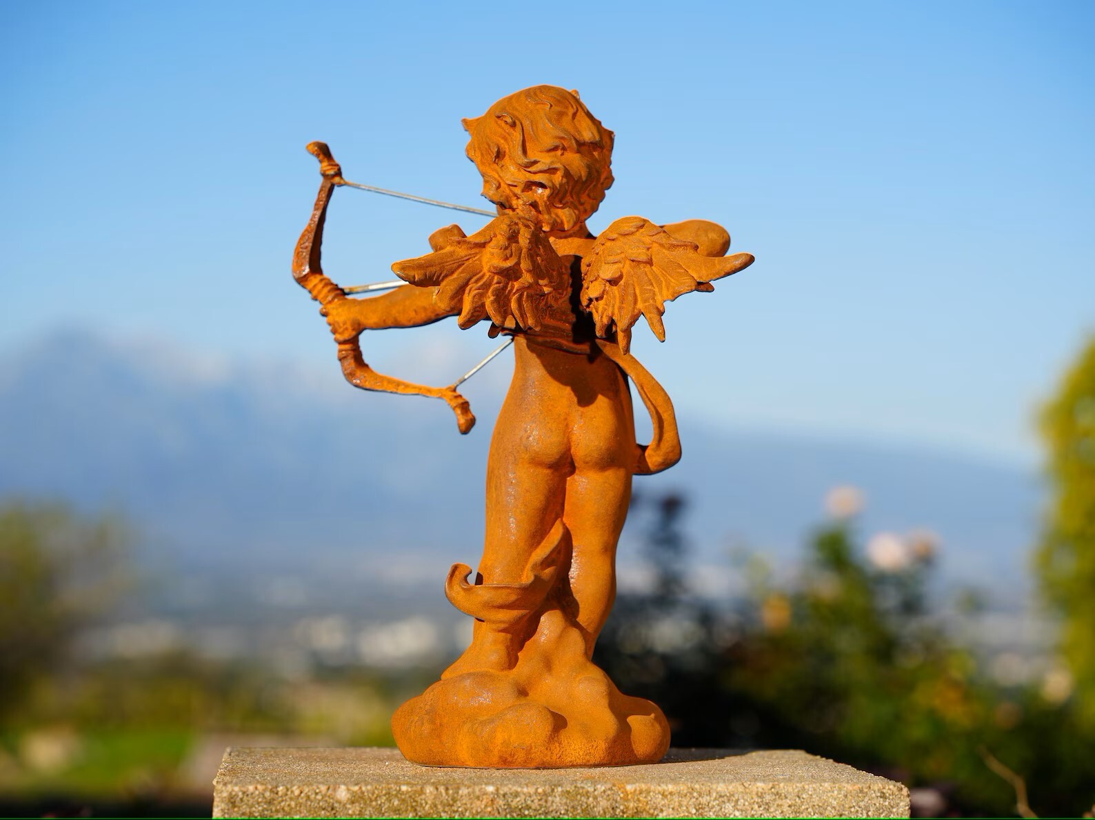 Vintage Cast Iron Cupid Statue Rustic Garden Cherub with Bow Outdoor Yard Art